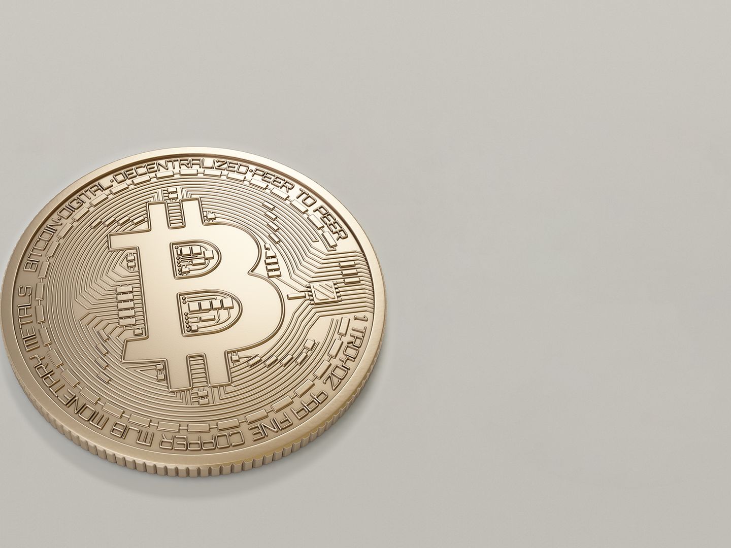 A detailed image of a Bitcoin cryptocurrency coin with a neutral background, symbolizing digital finance and currency.
